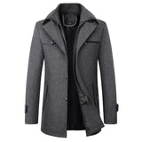 Men's dark gray wool blend double-breasted peacoat featuring a formal design with long sleeves, a notched collar, and button details.