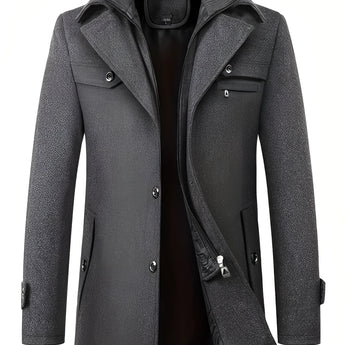 Men's dark gray wool blend tailored trenchcoat with a rear vent, featuring a classic collar, button closure, long sleeves, and side pockets.