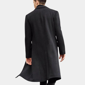 Men's black wool trenchcoat with tailored design, featuring a structured collar, long sleeves, and a fitted waist, suitable for winter wear.