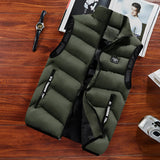 Men's Military Green Insulated Puffer Vest in 5XL, ideal for lightweight winter layering, displayed on a wooden surface.