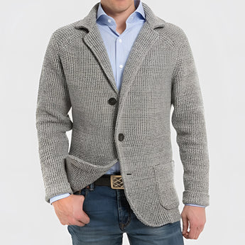 Men's light gray knit blazer made of wool featuring a casual design with a notch lapel, displayed on a mannequin.