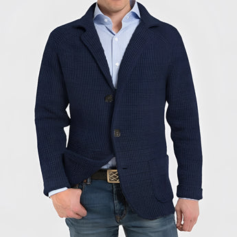 Men's dark blue knit blazer in a casual wool design with a notch lapel, featuring long sleeves and a tailored fit, suitable for formal and semi-formal occasions.
