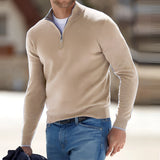 Men's blue lightweight half-zip sweater with a casual comfort fit, featuring a high collar and long sleeves.