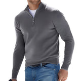 Men's blue lightweight half-zip sweater with a collar and long sleeves, displayed on a mannequin, showing casual comfort fit in a neutral setting.