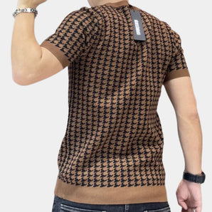 Men's brown houndstooth slim fit tee featuring detailed knit design, displayed on a model with focus on the upper body, highlighting the short sleeves and round neckline.