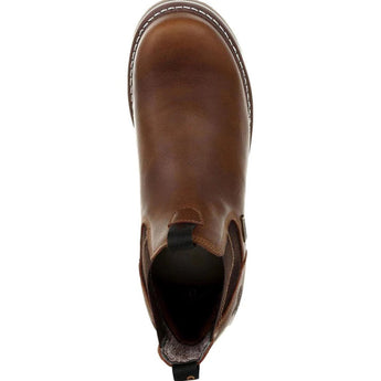 Men's brown leather Chelsea boots featuring elastic panels, displayed on a wooden surface.