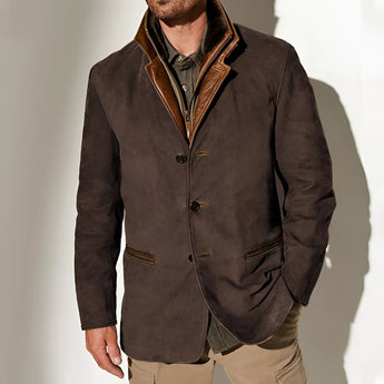 Men's dark brown suede blazer with leather trim, features a stylish collar, buttoned front, and long sleeves, designed for luxury with a sophisticated fashion appeal.