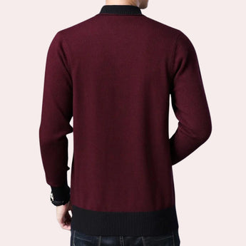 Men's burgundy knit sweater with long sleeves and a round collar, suitable for winter wear.
