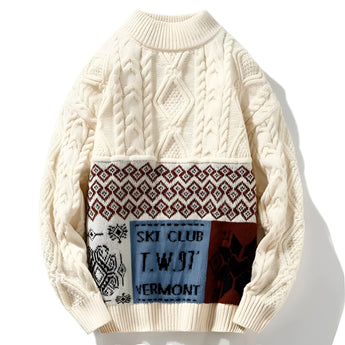 Men's cable knit ski sweater in navy blue, featuring a crewneck design and made from wool.
