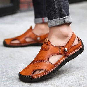 Brown leather sandals with a casual design, featuring a breathable and lightweight slip-on style for men.