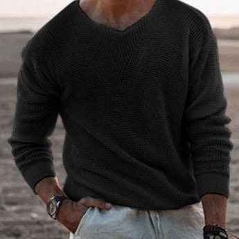 Men's casual white lightweight V-neck knit sweater worn by a man with a black beard, showcasing the shoulder and neck area, ideal for spring fashion.