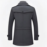 Men's charcoal grey wool blend tailored winter overcoat with long sleeves, a structured collar, and a formal design.