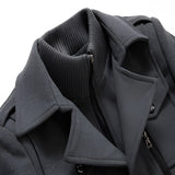 Men's charcoal wool slim fit overcoat featuring a military style design with a structured collar and long sleeves, showcased in a grey color.