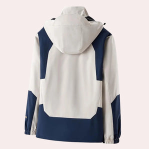Men's color-block hooded windbreaker jacket hanging on a clothes hanger, showcasing its lightweight and stylish design with a prominent collar and long sleeves.