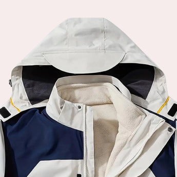 Men's color-block hooded windbreaker jacket in electric blue with a stylish pattern, featuring long sleeves and a fashionable collar.