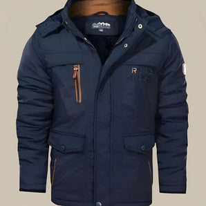 Men's dark blue hooded winter jacket with multiple pockets and water-resistant fabric, featuring long sleeves and a high collar.