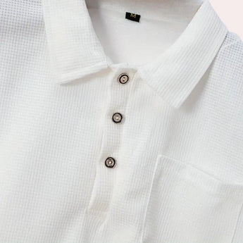 Men's designer white polo shirt with short sleeves and a classic collar, featuring a lightweight and breathable fabric suitable for formal or casual occasions.