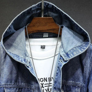 Men's distressed denim jacket with hoodie featuring vintage streetwear design, displayed on a mannequin, showcasing its collar and sleeves with textured denim fabric.
