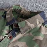 Men's military camo style jacket featuring a camouflage pattern in shades of grey, khaki, and beige with long sleeves and a collar, designed for tactical outerwear.