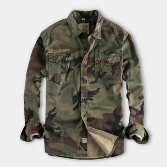 Men's durable military camo style jacket in a classic camouflage pattern, featuring long sleeves, a collar, and tactical design elements in a 3XL size.