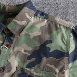 Men's durable military camo style jacket featuring a grey camouflage pattern, long sleeves, and a sturdy collar, designed for tactical outerwear use.
