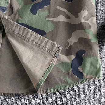 Men's military-style camo jacket featuring a grey camouflage pattern with long sleeves, designed for durability and tactical use.
