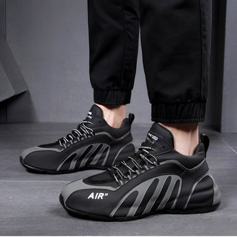 Men's grey futuristic design sneakers featuring a sleek and stylish urban athletic look, shown in size 45, Nero11 variant, against a neutral flooring background.