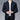 Men's formal dark blue slim fit blazer, styled with a dress shirt and showcasing a collar and sleeves; suitable for business wear.