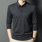 Men's gray geometric V-neck polo pullover with a diamond knit pattern, featuring long sleeves and a classic collar, styled for a 2XL fit.