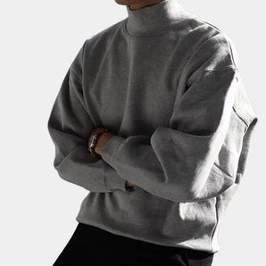 Men's gray casual turtleneck sweater with a pocket, featuring long sleeves and a comfortable cotton-blend fabric.