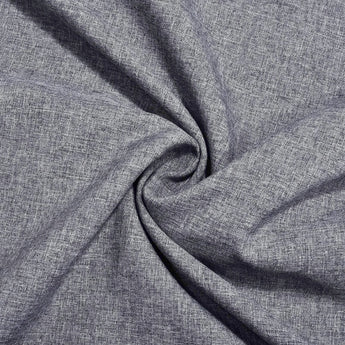 Men's long sleeve gray chambray shirt made of breathable cotton fabric, displayed on a wooden background.