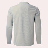 Men's gray slim fit blazer with long sleeves and a notched collar, featuring buttons on the front; designed as a casual, lightweight urban jacket suitable for a fashionable look.