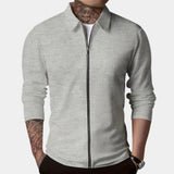 Men's gray slim fit blazer in a casual lightweight style, featuring long sleeves and a notched collar, designed for urban wear.
