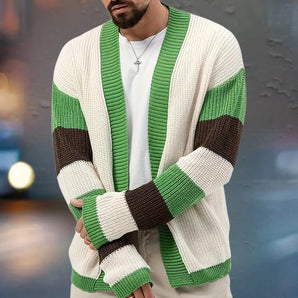 Men's oversized knit cardigan sweater with green and white horizontal stripes, featuring long sleeves and a relaxed fit, suitable for layering over shirts.