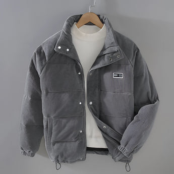 Men's grey corduroy insulated winter jacket with high collar, long sleeves, and front pockets, designed for an urban style in a 3XL size.