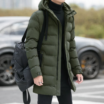Men's green long puffer winter coat with a hood, featuring insulated material and designed with a large size (4XL). The coat includes a full-length front zipper, long sleeves, and a waist-length fit.