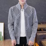 Men's grey knit bomber jacket with geometric wool pattern, featuring a zip-up front design, long sleeves, and a collar, suitable for winter fashion.