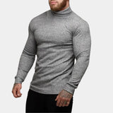 Men's grey knit turtleneck sweater, featuring a fitted muscle fit style, with long sleeves and a high neck, suitable for winter wear.