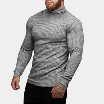 Men's grey knit turtleneck sweater, featuring a fitted muscle fit style, with long sleeves and a high neck, suitable for winter wear.