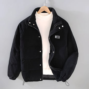 Men's grey quilted puffer jacket with corduroy patchwork, featuring a collar and button closure, shown in Nero color variant, size 2XL.