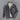 Men's grey quilted puffer jacket with corduroy patchwork detailing, featuring a collared neck and long sleeves, designed for winter wear.