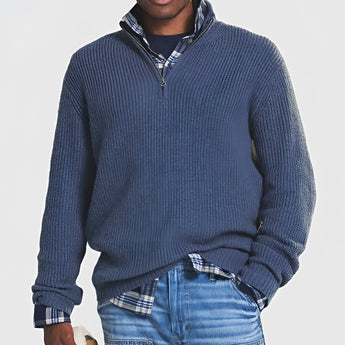 Men's grey ribbed half-zip sweater with a high neck and long sleeves, displayed on a mannequin, suitable for fall and winter wear.