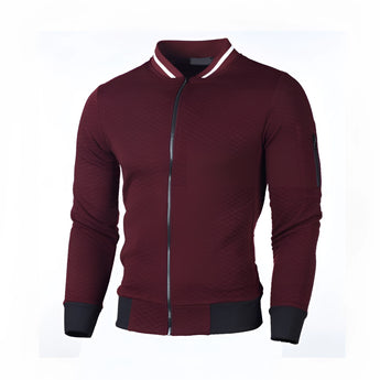Men's grey slim fit lightweight bomber jacket with a distinctive arm pocket, featuring a collar and long sleeves. The jacket's fabric is reminiscent of jersey material, providing a comfortable and stylish fit.