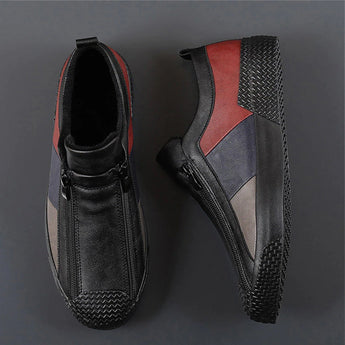 Men's grey slip-on sneakers with red accents, featuring a sporty and stylish design ideal for walking and outdoor activities.