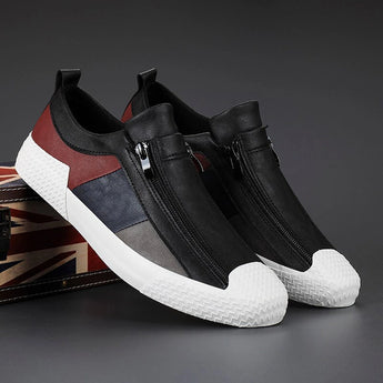 Men's grey slip-on sneakers with red accents, designed for athletic use and outdoor activities, featuring a comfortable and stylish fit ideal for walking, running, or cross-training.