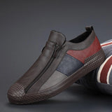 Men's grey slip-on sneakers with red accents, stylish and comfortable, shown in size 44, featuring a sleek design suitable for walking and casual outdoor activities.