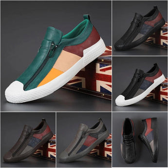 Men's grey slip-on sneakers with red accents, featuring a stylish and comfortable design ideal for fashion-forward walking.