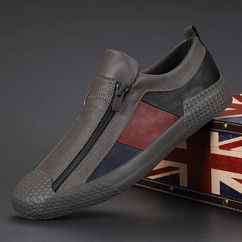 Men's grey slip-on sneakers featuring red accents, designed for style and comfort, shown in size 44 with a sporty and casual aesthetic.