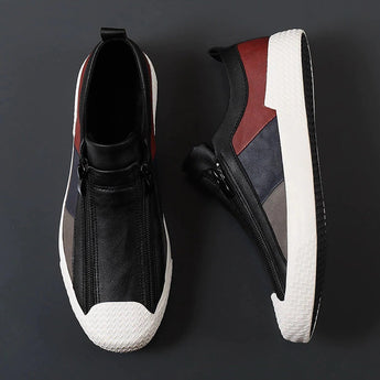 Men's grey slip-on sneakers with red accents, showcasing a stylish and comfortable design, perfect for casual wear and outdoor activities.