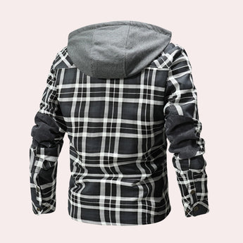Men's insulated sherpa-lined plaid flannel jacket in a grey tartan pattern with a collar and sleeves, designed for cozy winter wear.